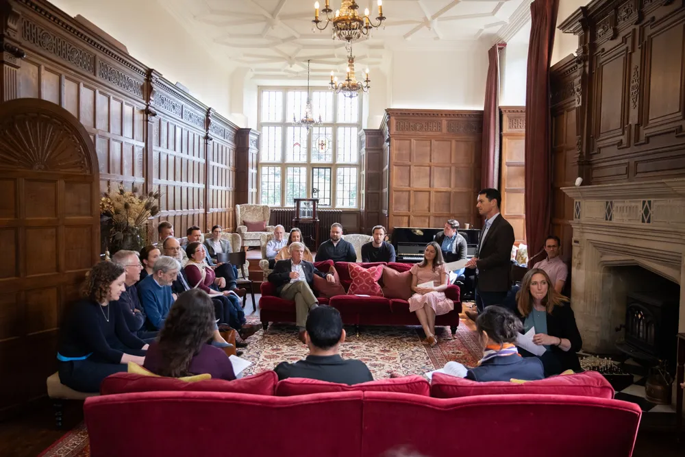 Faculty and postdoctoral scholars gathered for a discussion at the Yarnton Manor retreat.